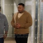Marty’s camel striped cardigan on The Neighborhood
