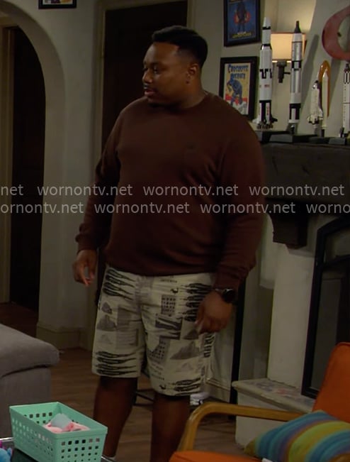 Marty's brown sweatshirt and printed shorts on The Neighborhood