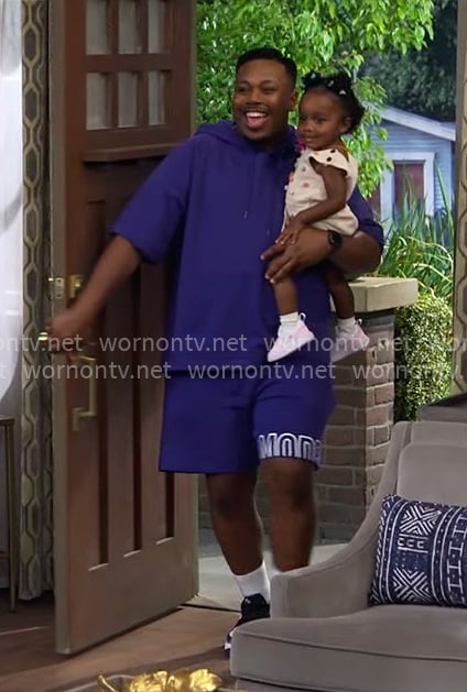 Marty’s purple sweatshirt and shorts set on The Neighborhood