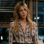 Morgan’s printed shirt and denim mini skirt with gold heart earrings on High Potential