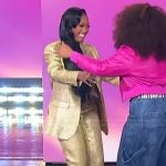 Muni Long’s gold metallic blazer on The Jennifer Hudson Show