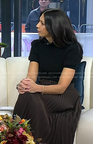 Natalie’s black puff sleeve top and brown pleated skirt on Today
