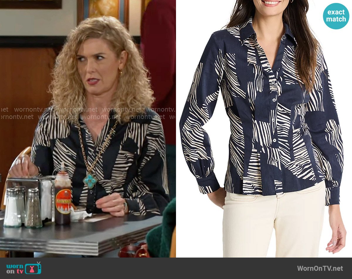 Jan’s blue zebra print shirt on Beyond the Gates