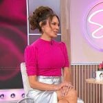 Tracy McMillan’s pink puff sleeve top and skirt on Sherri