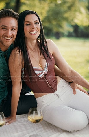 Raquel's brown grommet leather vest on Elsbeth