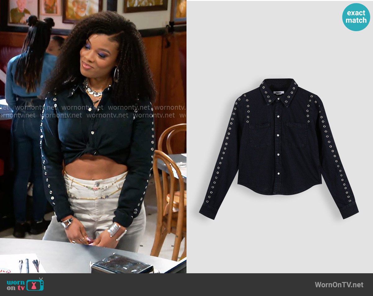 Re/Done Denim blouse with eyelets worn by Eva Thomas (Ambyr Michelle) on Beyond the Gates