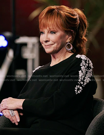 Reba's black floral embroidered sweater on The Voice