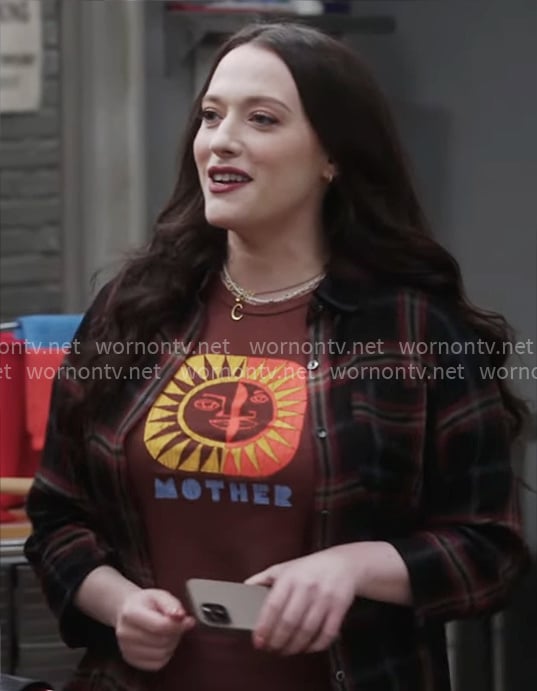 Riley's sun graphic tee and plaid shirt on Shifting Gears
