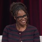 Jacqueline Coley’s striped cardigan on Access Hollywood
