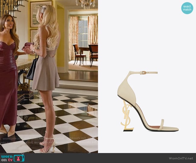 Saint Laurent Opyum Sandals in smooth leather with a gold-tone heel worn by Emma Hernan on Selling Sunset