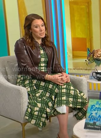 Sarah Gelman's green plaid dress and brown leather shirt on CBS Mornings