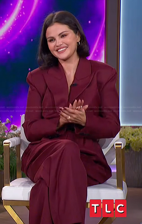 Selena Gomez's burgundy blazer jumpsuit on The Jennifer Hudson Show