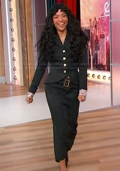 Silvia Dionicio's black blazer and skirt on Sherri