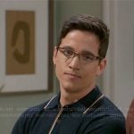 Smitty’s navy polo sweater with striped trim on Beyond the Gates