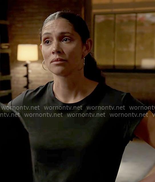 Stella's black muscle tee on Chicago Fire