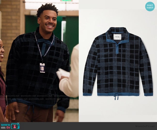 Tariq’s blue plaid sweater on Abbott Elementary