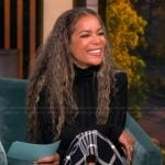 Sunny’s black turtleneck sweater and plaid skirt on The View