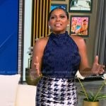 Tamron’s navy sleeveless top and sequin houndstooth skirt on Tamron Hall Show