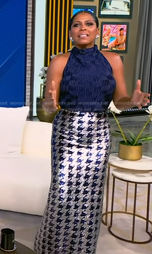 Tamron's navy sleeveless top and sequin houndstooth skirt on Tamron Hall Show