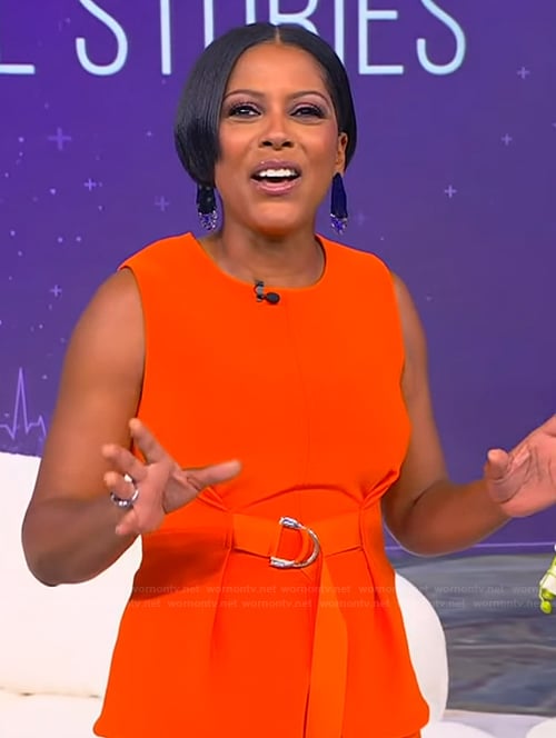 Tamron’s orange belted vest on Tamron Hall Show