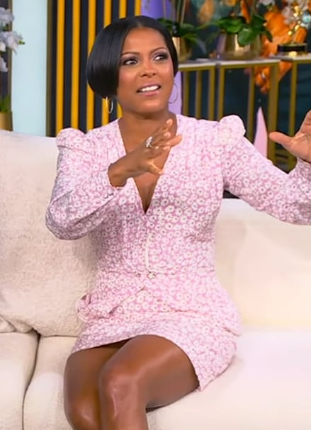 Tamron’s pink floral print mini dress on Tamron Hall Show