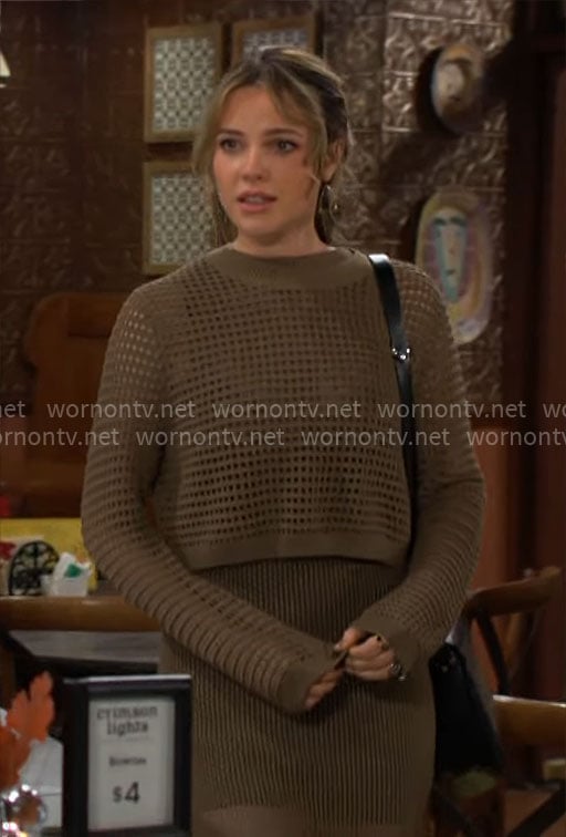 Tessa’s green knit sweater on The Young and the Restless