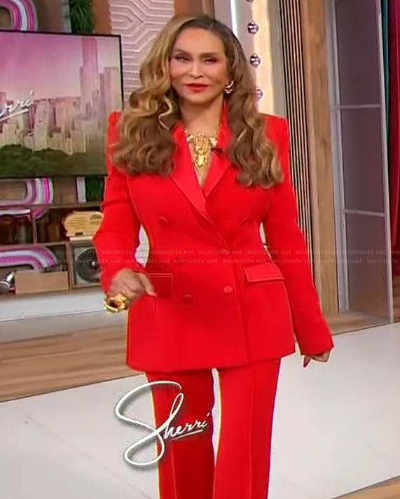 Tina Knowles’s red double breasted blazer on Sherri