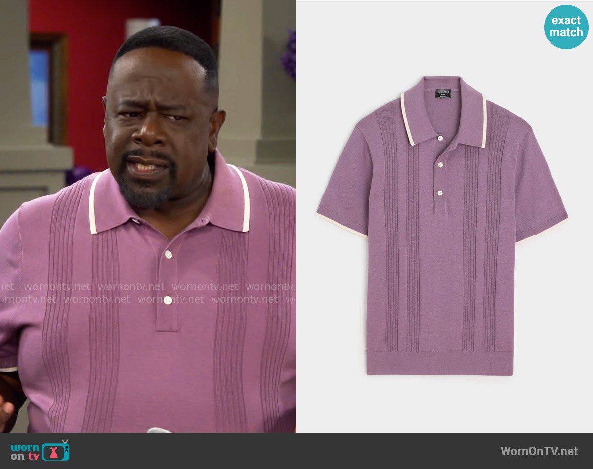 Calvin’s purple polo shirt on The Neighborhood