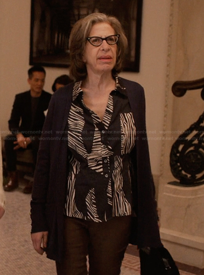 Uma’s printed ruffle blouse on Only Murders in the Building