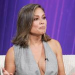 Vanessa Lachey’s gray drape top and pants on Access Hollywood