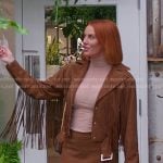 Whitney’s brown suede fringe jacket and mini skirt on The Real Housewives of Salt Lake City