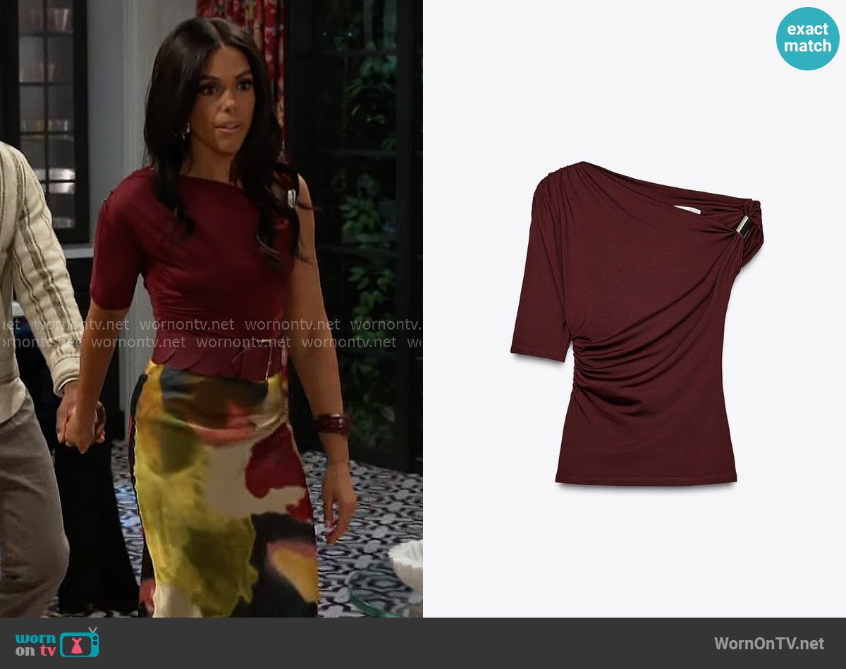 Zara Asymmetric Top with Metal Applique worn by Dani Dupree (Karla Mosley) on Beyond the Gates