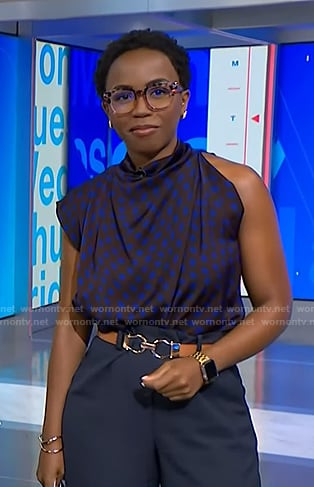 Zinhle's brown polka dot asymmetric top on NBC News Daily
