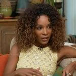 Zuri’s yellow embellished dress on Access Hollywood