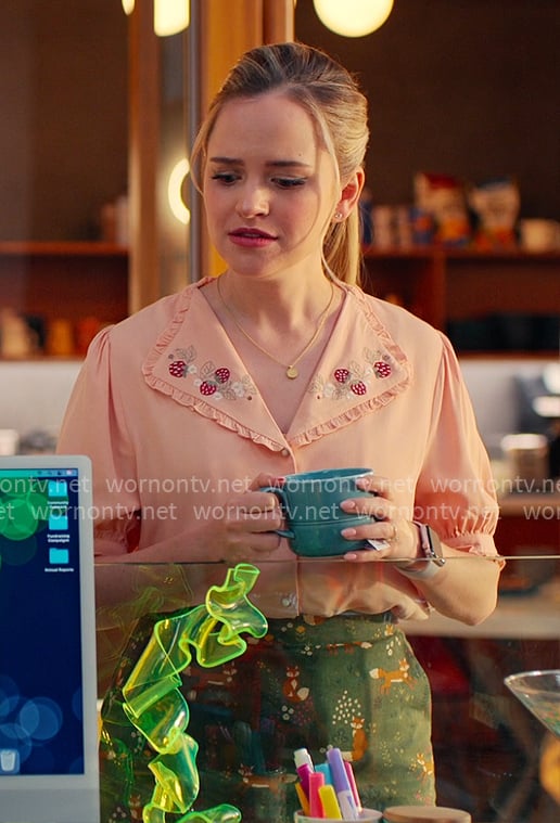 Ainsley’s embroidered peach blouse and fox skirt on Loot