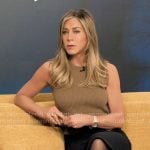 Alex’s camel brown sweater vest on The Morning Show