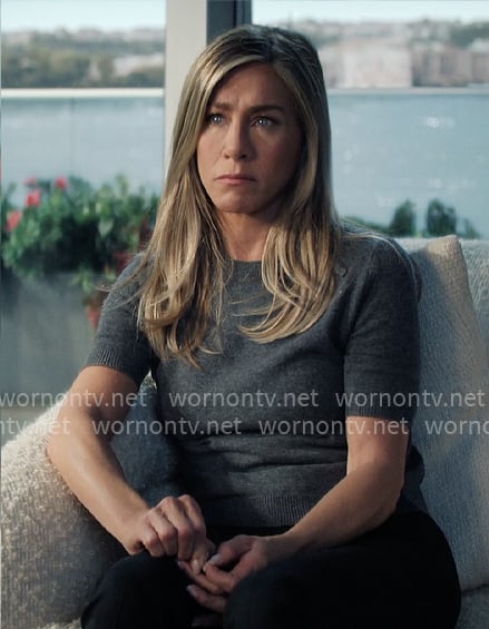 Alex’s grey short-sleeve sweater with bow on The Morning Show