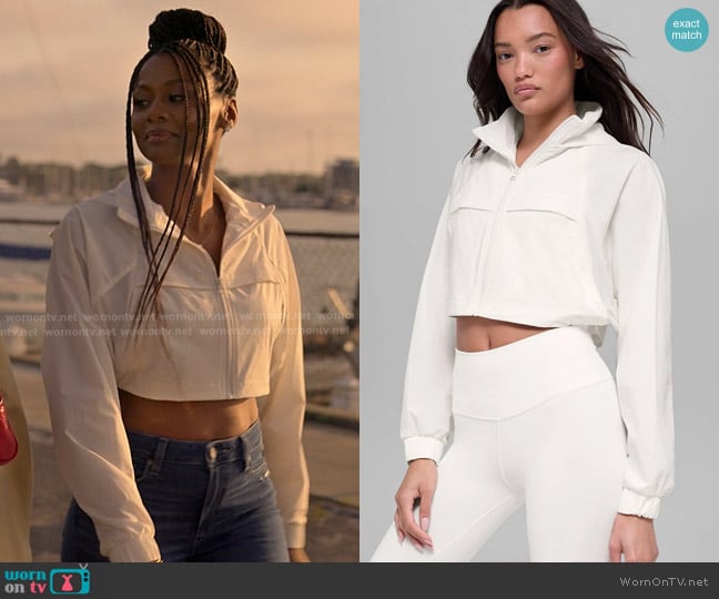 Alo Yoga Cropped Playmaker Jacket in Ivory worn by Jax Stewart (Emayatzy Corinealdi) on Reasonable Doubt