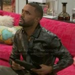 Andre’s brown leather shirt on Beyond the Gates