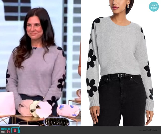 Aqua Cashmere Floral Sleeve Sweater worn by Honor Elliott on The View