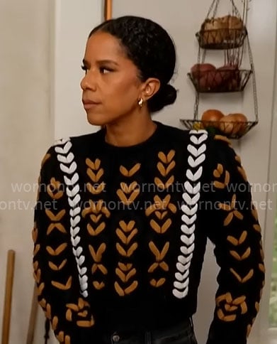 Ariana Diaz’s navy chunky knit sweater on CBS Mornings