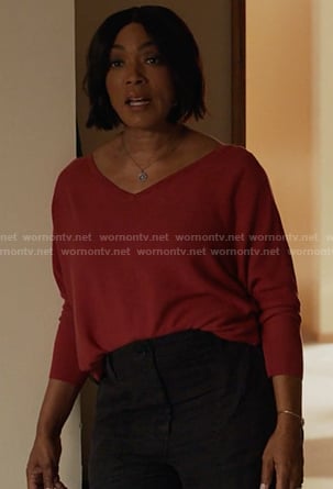 Athena's red v-neck sweater on 9-1-1