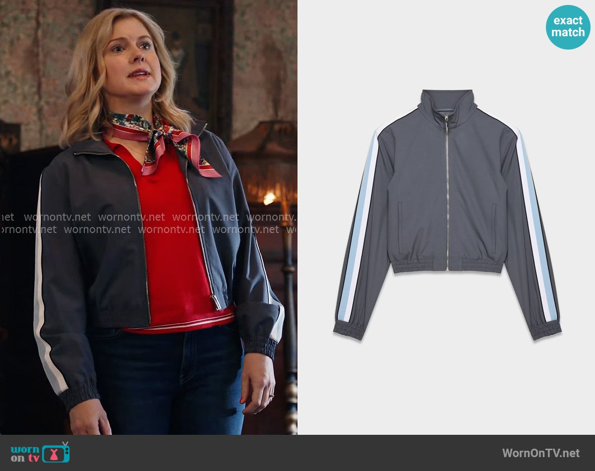 Sam’s grey jacket with striped sleeves on Ghosts