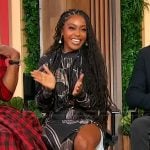 Dominque’s black floral top and skirt set on Sherri