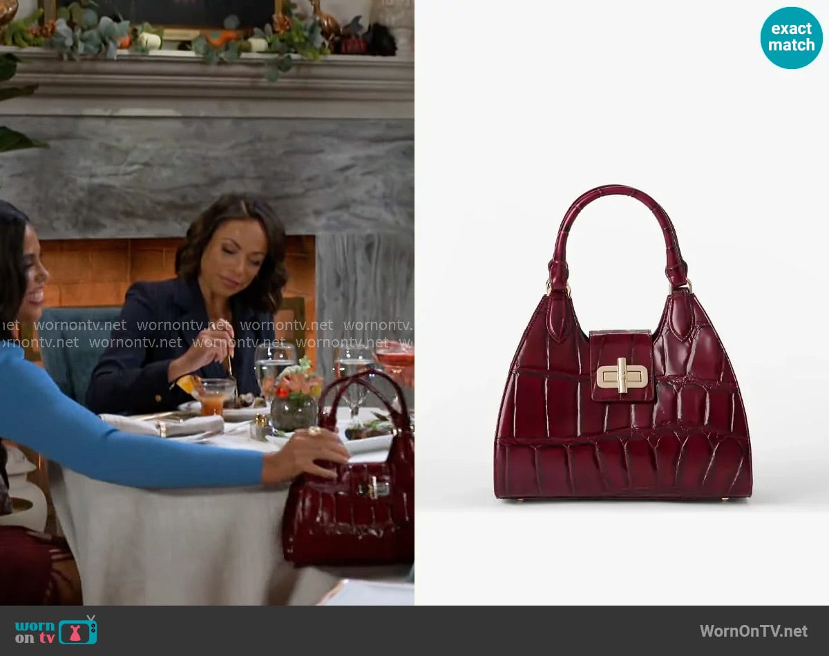 Brahmin Adrian Bag in Merlot Nerina worn by Dani Dupree (Karla Mosley) on Beyond the Gates