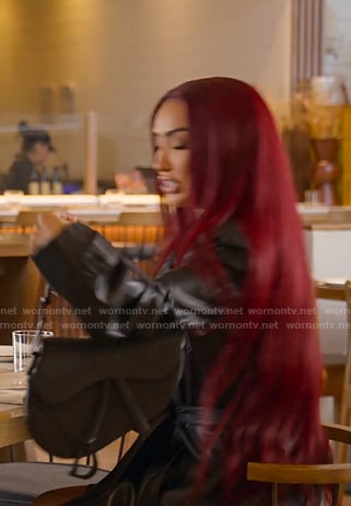 Bre's black shoulder bag on Selling Sunset