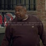 Calvin’s brown Kith sweater on The Neighborhood