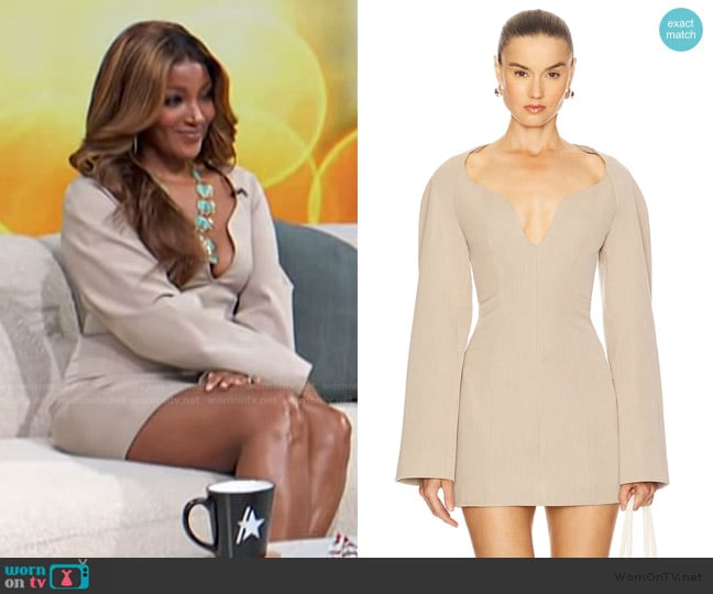 Mickey Guyton’s beige mini dress on Access Hollywood