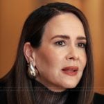 Carr’s silver drop earrings on Alls Fair