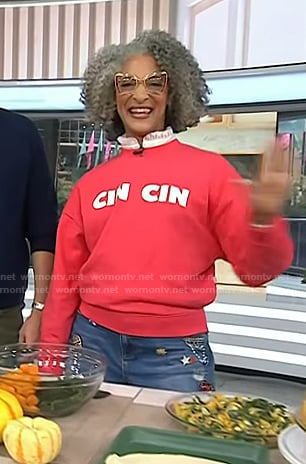 Carla Hall's red Cin Cin Sweatshirt and embellished jeans on Today